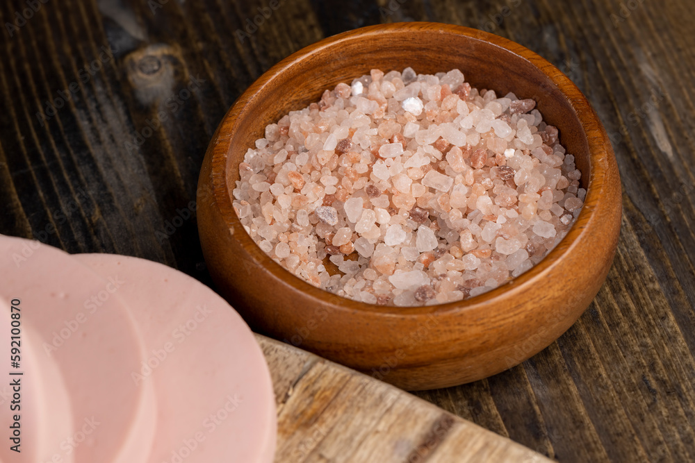 Pink natural salt on the table, close up Pink natural salt on the table, close up