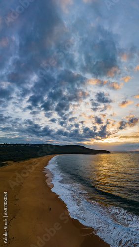 Fototapeta Naklejka Na Ścianę i Meble -  Sunrise seascape with clouds and gentle surf