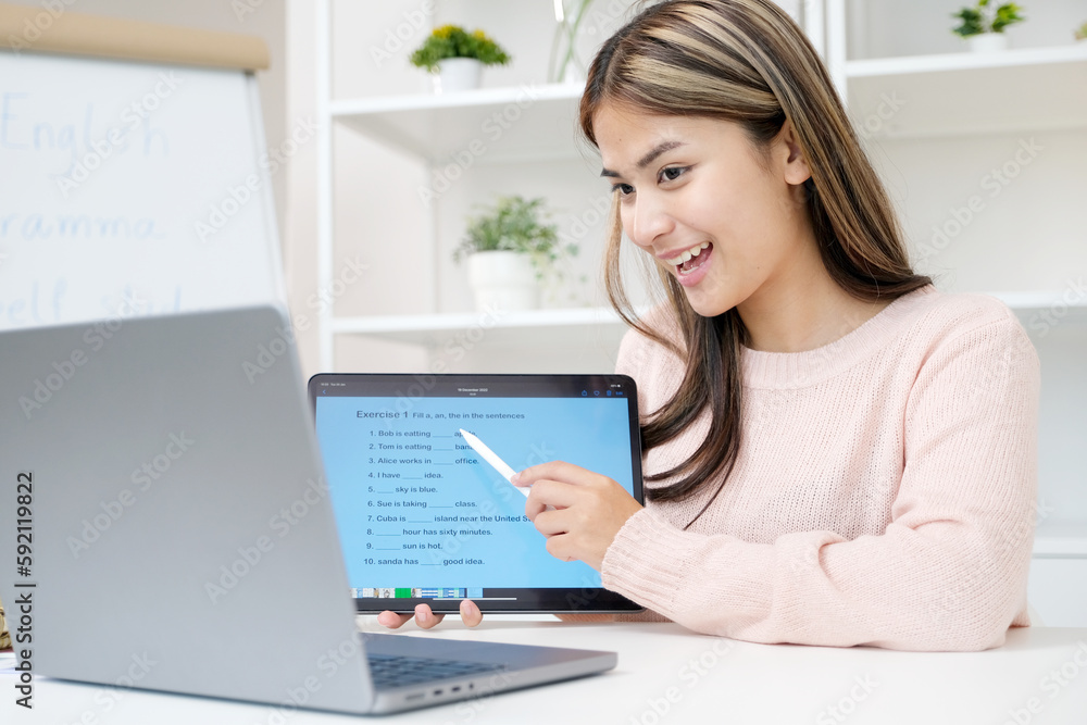 Woman study english language online by laptop computer, learning online course Woman study english language online by laptop computer, learning online course
