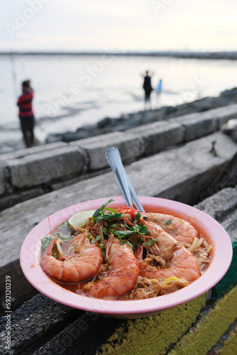 Local prawn noodles Mee Udang at Kuala Kuaq beach, Alor setar. photo