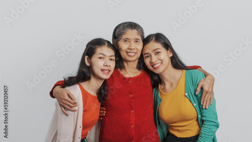 Mother's day, woman birthday anniversary, Senior elderly mature asian millennial grandmother with female daughter only women three people twin grand sister and young sister, real family person.
