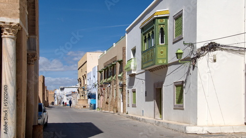 Fototapeta Naklejka Na Ścianę i Meble -  Buildings with balconies around the Great Mosque in Kairouan, Tunisia