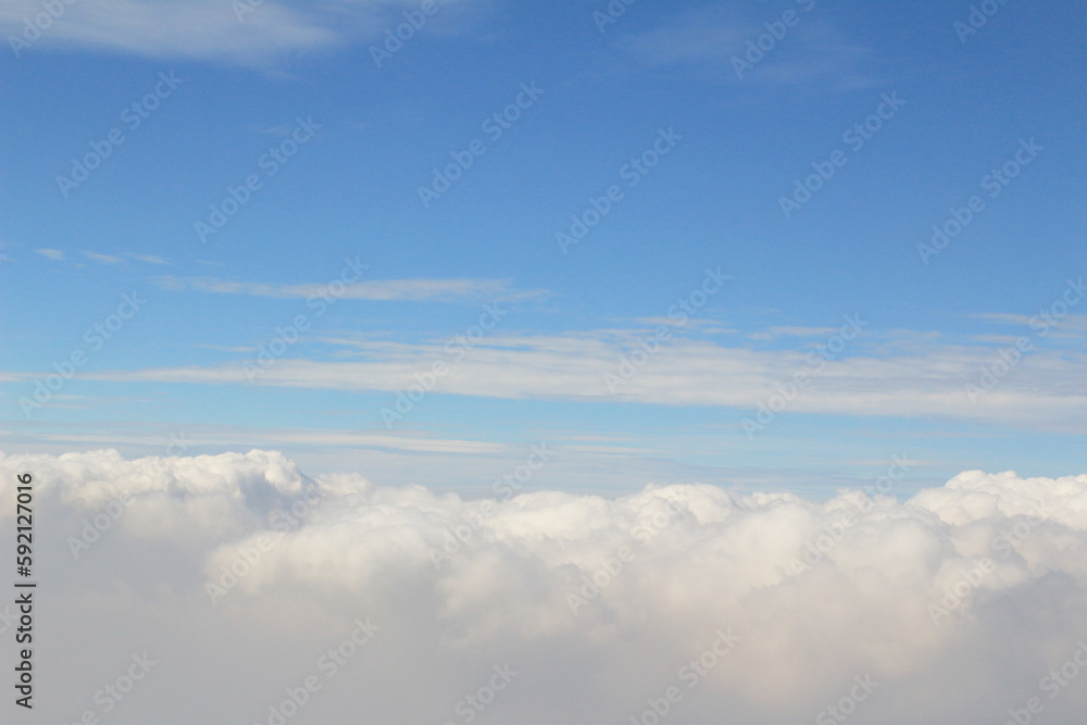 a Plane fly with cloud Blue sky a Plane fly with cloud Blue sky