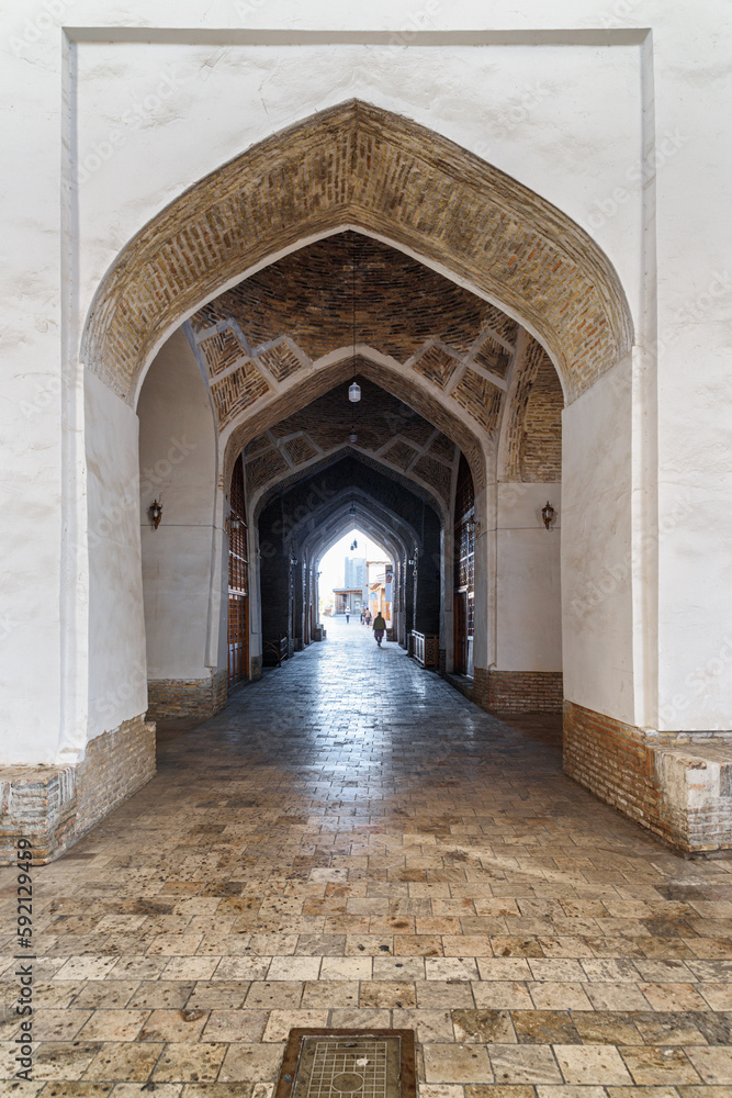 Arched passageway through the Toqi Telpak Furushon in Bukhara