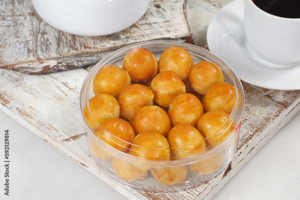 Pineapple tart or nanas tart or nastar cookies. cookies with pineapple jam inside on bright mood Pineapple tart or nanas tart or nastar cookies. cookies with pineapple jam inside on bright mood