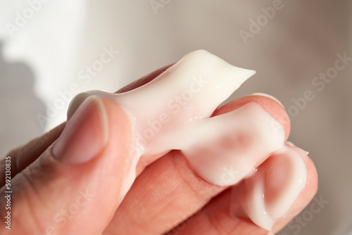 Photo of the texture of a moisturizing cream on the hand. photo