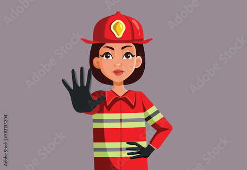 Firewoman Making a Stop Sign Warning about Fire Hazards Vector Cartoon. Female first responder keeping people away from arson zone
