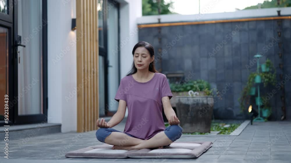 Mature woman doing yoga outdoors,4K Mature woman doing yoga outdoors,4K