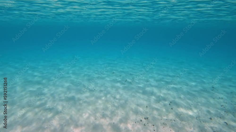 Rays of sun shining on the ocean floor in Cayman Islands. Rays of sun shining on the ocean floor in Cayman Islands.