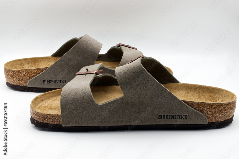 Bologna - Italy - April 2023: leather Birkenstock cork sandals, isolated on white background. Stock | Stock