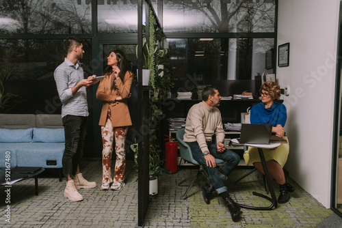 Wallpaper Mural Inter-generational business people working together at modern co working space Torontodigital.ca