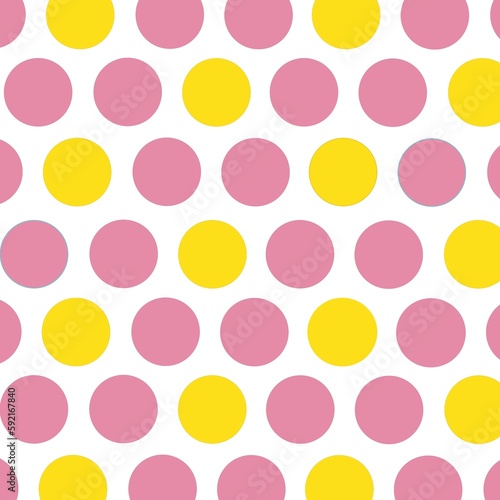 Yellow and pink polka dots on white background 
