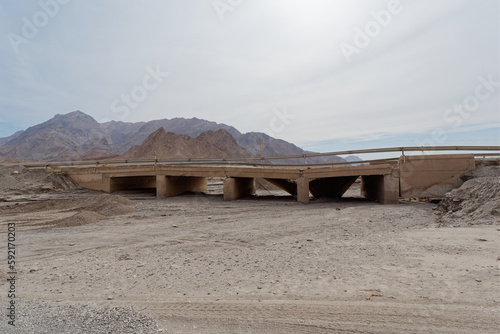 Damaged bridge near the historic Chak Chak village in Yazd Province, Iran photo