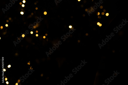 bokeh lights on black background © Anastasiia