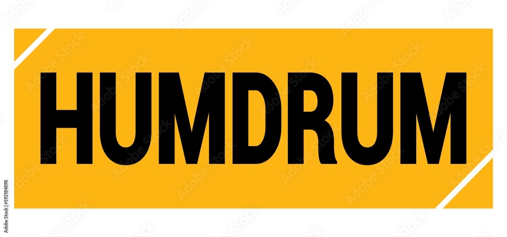 HUMDRUM text on yellow-black grungy stamp sign. HUMDRUM text on yellow-black grungy stamp sign.