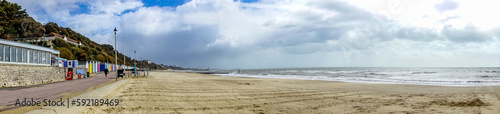 A view along Alum Chime beach at Bournemouth, Dorset, UK in April 2023