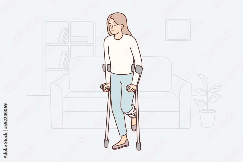 Disabled woman getting around with crutches injuring knee during car accident or fall Disabled woman getting around with crutches injuring knee during car accident or fall