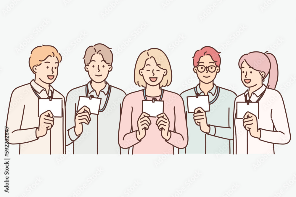 Group of business people with badges working in same department of large corporation Group of business people with badges working in same department of large corporation