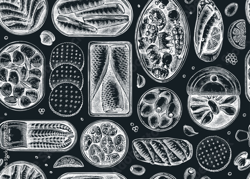 Seafood background on chalkboard. Hand-drawn tinned fish seamless pattern. Sardines, anchovy, mackerel, tuna, mussels in tin cans, fish canapes, olives, crackers sketches. For packaging or textile