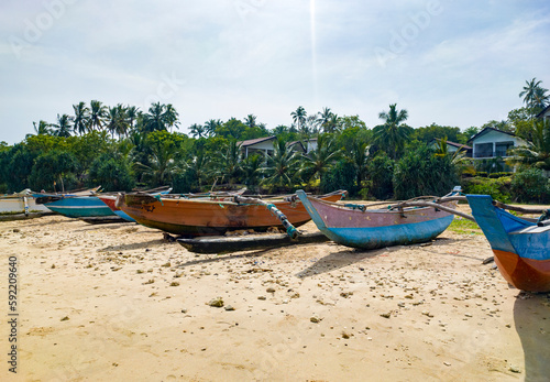 Beautiful tropical landscape with colorful fishing village boats. Photography for tourism background, design and advertising. 10 January 2023, Sooriya, Sri Lanka