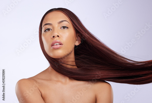 Hair care, portrait or woman with long hair style, luxury salon treatment or color isolated on white background. Hair styling, beauty salon or Brazilian girl model with hair growth results in studio