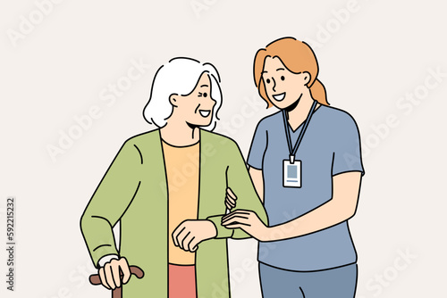 Smiling female caregiver help mature woman with walking. Happy nurse in uniform assist elderly grandmother with walking stick. Vector illustration. 