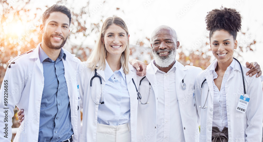 Doctors, hug together and group portrait for motivation, success or team building at hospital. Men, women and teamwork with solidarity, support or diversity in healthcare, goals and friends at clinic