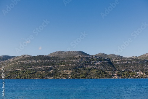 The coastline of the island of Korcula in southern Croatia and the view of the Peljesac peninsula. © Grzegorz