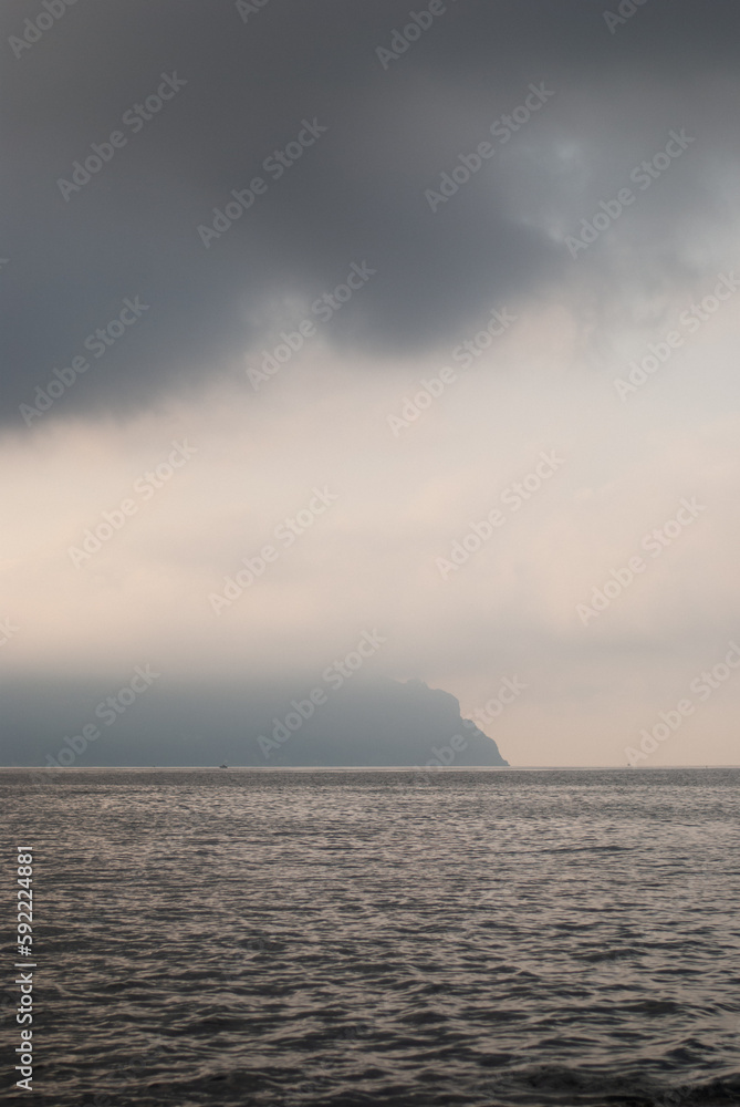 View of white clouds over sea in calm weather 