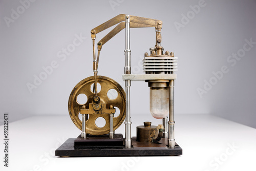 closeup of a stirling engine construction isolated on white