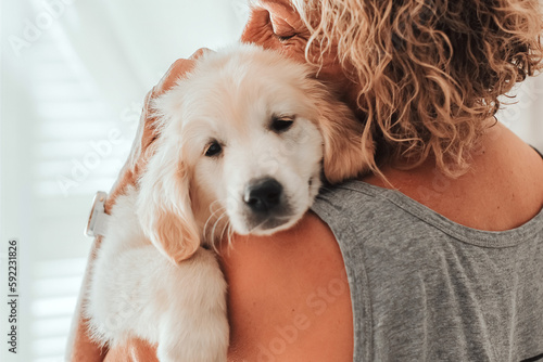 portrait depressed senior woman hugging dog puppy golden retriever pet therapy canisterapy old adults emotion mental health friends love tightly depression,anxiety,tired elderly cry alone home