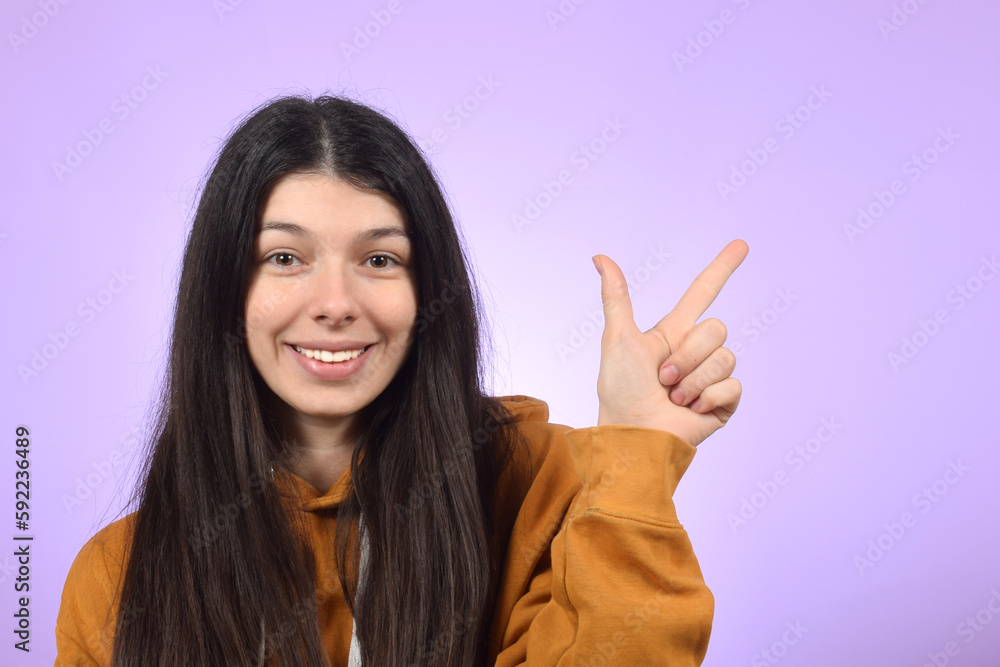 cute pretty woman pointing direction with fingers cute pretty woman pointing direction with fingers