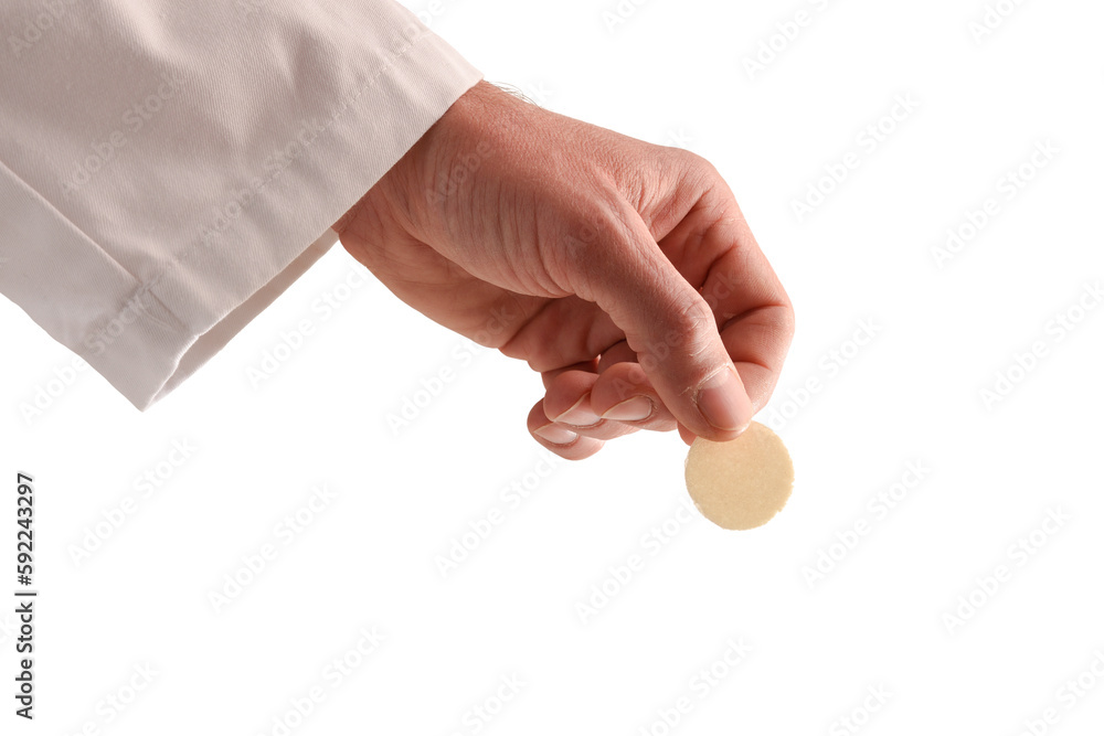 Priest offering a consecrated host on a white isolated background Priest offering a consecrated host on a white isolated background
