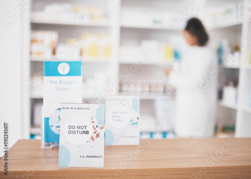 Fotografija Employee break, pharmacy sign and shop poster of an busy retail board in healthcare store