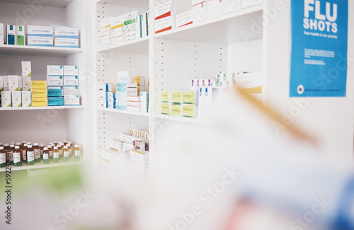 Healthcare, pharmacy or shelf with medicine pills or supplements products at drugstore clinic. Pharmaceuticals background, blurry or boxes of medical products, supplements stock or retail medication