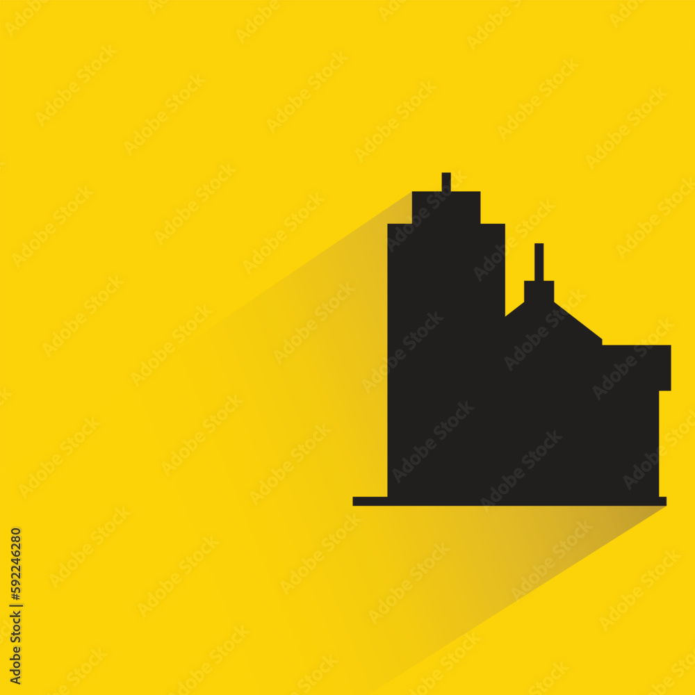 silhouette city building with shadow on yellow background silhouette city building with shadow on yellow background