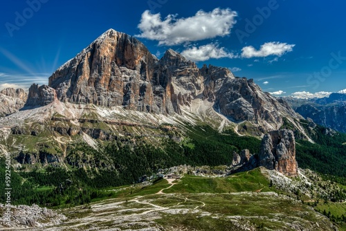 Scenic shot of rocky Dolomitic Mountains in Italy with a cloudscape in the background