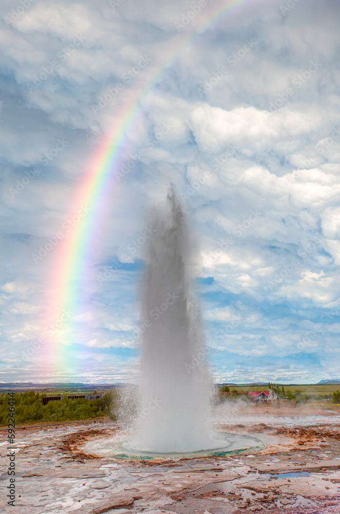 Eruption of Strokkur Geyser with rainbow in Iceland– Haukadalur Valley Iceland Eruption of Strokkur Geyser with rainbow in Iceland– Haukadalur Valley Iceland