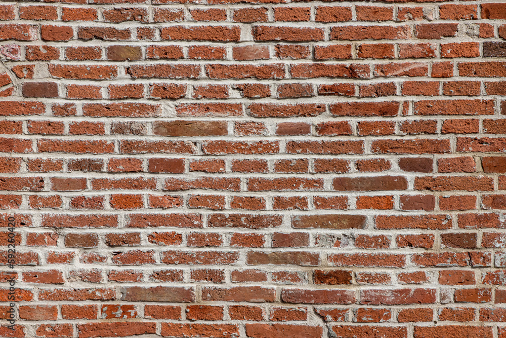 Fototapeta premium dark texture of old red bricks wall background