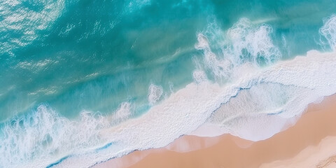 Ocean waves on the beach as a background. Beautiful natural summer vacation holidays background. Aerial top down view of beach and sea with blue water waves