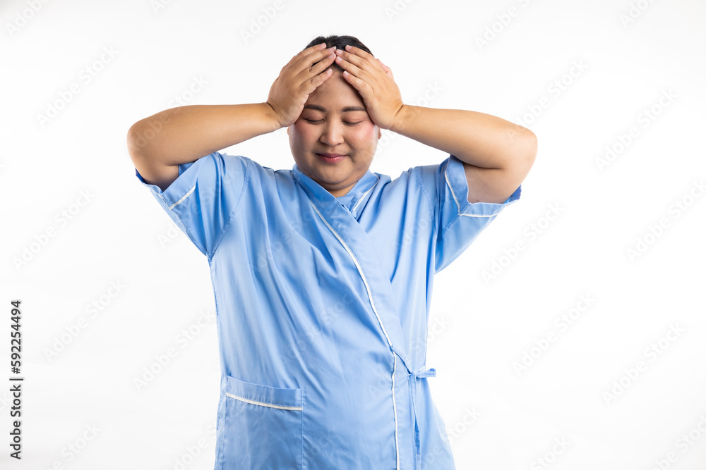 Asian female suffering from headache desperate and stressed. Happy smiling asian women patient on white background. Fat and overweight obese woman Asian female suffering from headache desperate and stressed. Happy smiling asian women patient on white background. Fat and overweight obese woman