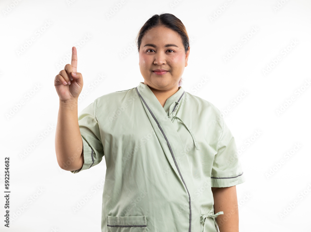 Excite female patient pointing up and looking at camera. Happy winner smiling asian women patient on white background. Fat and overweight obese woman Excite female patient pointing up and looking at camera. Happy winner smiling asian women patient on white background. Fat and overweight obese woman