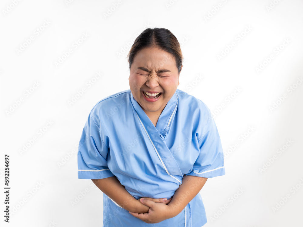 Female having stomach ache, bending and holding hands on belly. Stomach ache asian women patient on white background. Fat and overweight obese woman Female having stomach ache, bending and holding hands on belly. Stomach ache asian women patient on white background. Fat and overweight obese woman