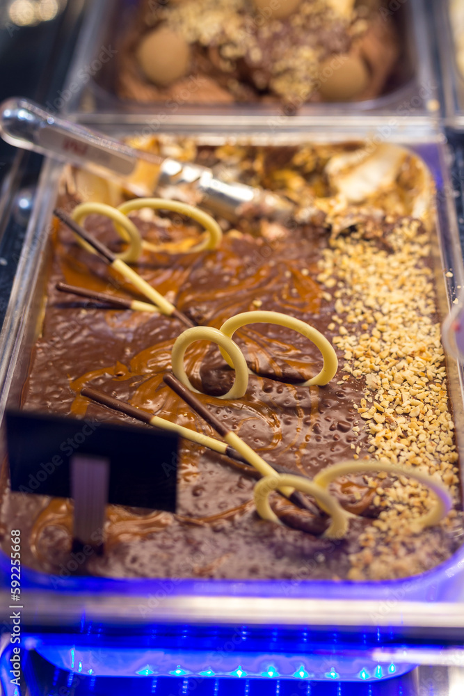 Chocolate ice cream in a showcase. Lots of nice ice cream. Chocolate ice cream in a showcase. Lots of nice ice cream.
