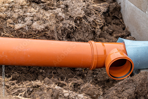 Wallpaper Mural plastic pvc waste sewer pipe in the ground. construction site Torontodigital.ca