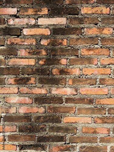 old red and black brick wall with cement texture background