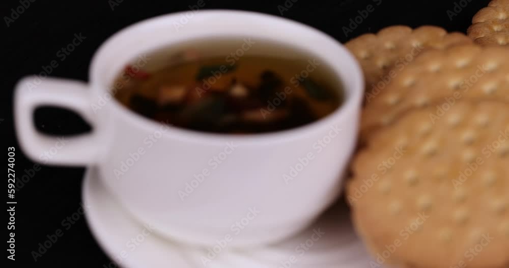 crispy cookies with chocolate filling between cookies, fresh crispy cookie sandwich and tea crispy cookies with chocolate filling between cookies, fresh crispy cookie sandwich and tea