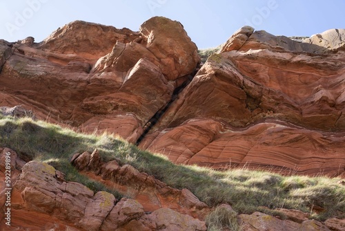 Low angle shot of a red stone canyon