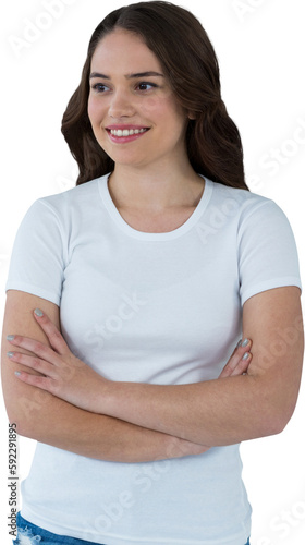 Smiling female model standing with arms crossed © vectorfusionart