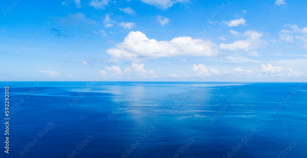 Aerial view of a blue sea surface water texture background and sun reflections,Aerial flying drone view Waves water surface texture on sunny tropical ocean landscape,Nature background Aerial view of a blue sea surface water texture background and sun reflections,Aerial flying drone view Waves water surface texture on sunny tropical ocean landscape,Nature background